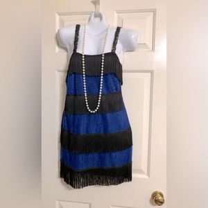 Good used “flapper” fringe dress, size Medium for Halloween or themed party.
